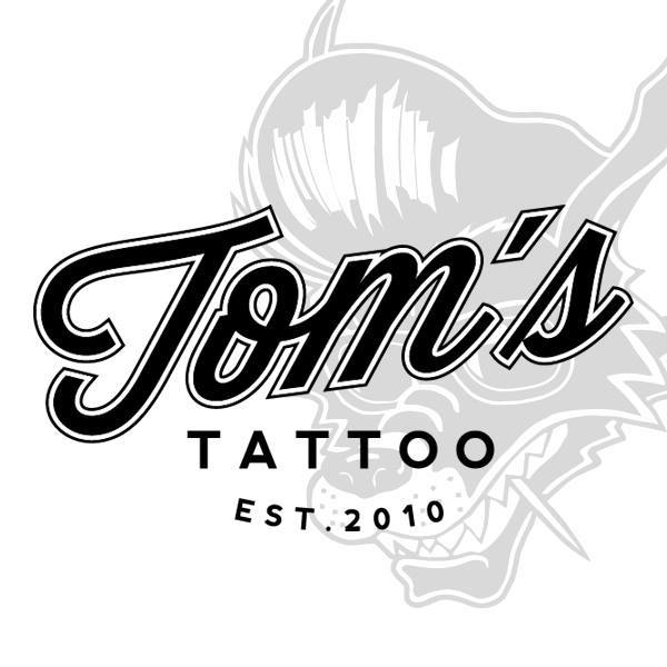 Dieses Bild zeigt das Logo des Unternehmens TOM'S TATTOO & PIERCING | München